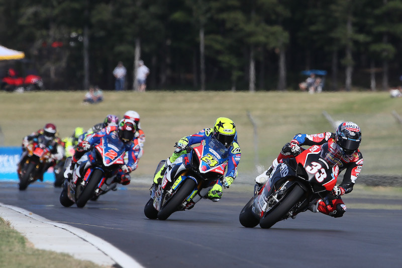 Kyle Wyman (33) leads Toni Elias (24), Josh Herrin (2) and others during a Superbike race at Barber Motorsports Park.