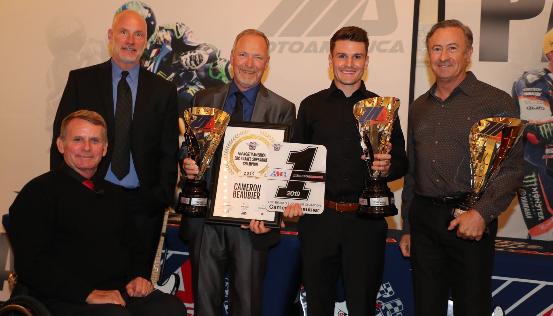 (From left to right) MotoAmerica President Wayne Rainey, AMA Chief Operating Officer Jeff Massey, crew chief Rick Hobbs, Cameron Beaubier and team manager Tom Halverson celebrate Beaubier's Superbike Championship at the Night of Champions. Photo by Brian J. Nelson.