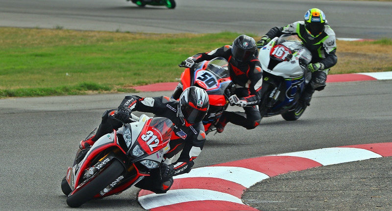 WERA racers Aaron Ascher (312), Nicholas Ciling (50), and Sahar Zvik (161) during a previous event at Auto Club Speedway. Photo by Caliphotography.com.