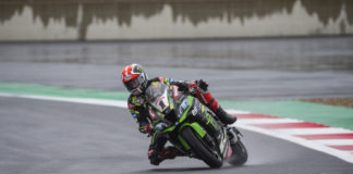 Jonathan Rea (1) in action in the wet at Magny-Cours. Photo courtesy of Kawasaki.