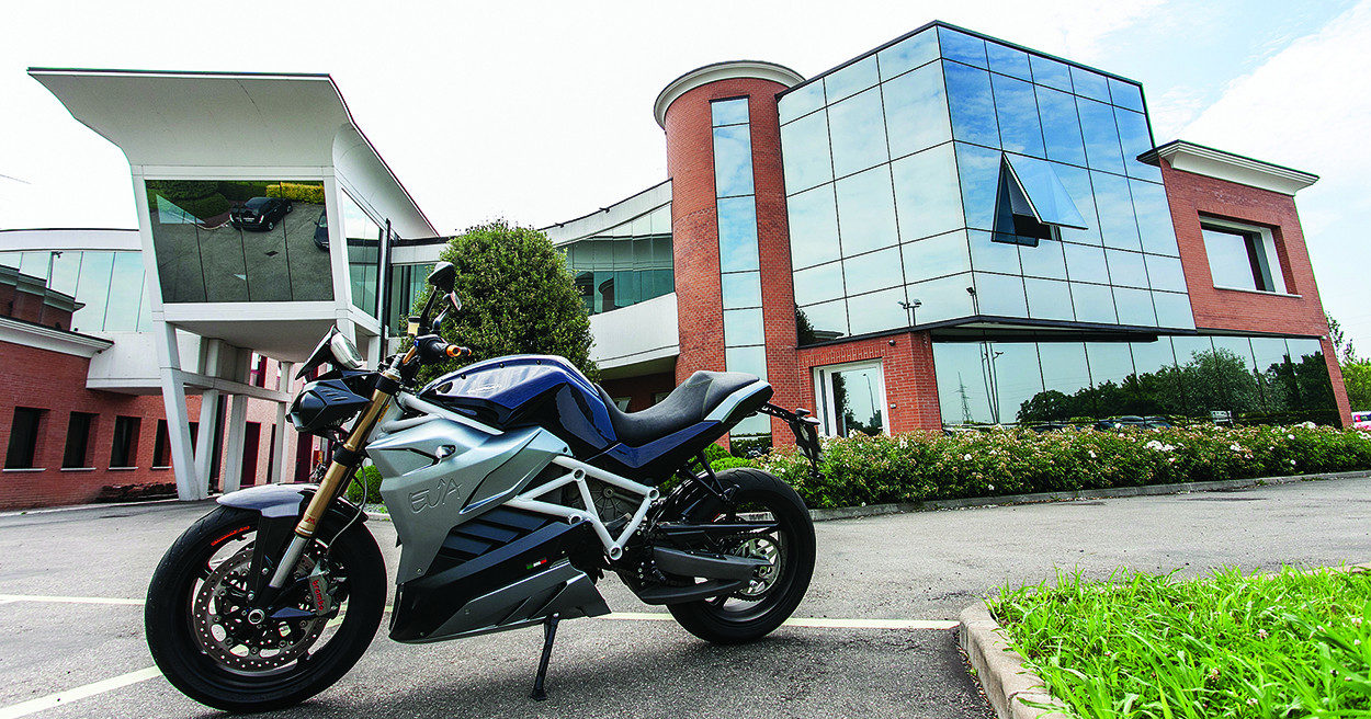 Energica Motor Companys headquarters in Modena, Italy, with an Eva electric streetbike model parked outside. Photo by Damiano Florentini.