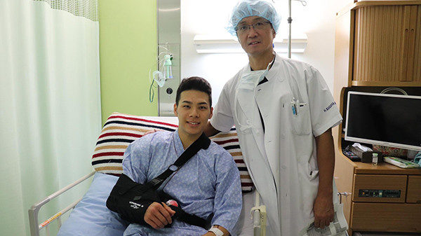 MotoGP racer Takaaki Nakagami (left) with Dr. Hiroyuki Sugaya (right). Photo courtesy of LCR Honda.