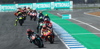 MotoGP Race In Thailand Postponed Fabio Quartararo (20) leads Marc Marquez (93) and the rest of the field early in the MotoGP race in Thailand in 2019. Photo courtesy of PETRONAS Yamaha SRT.