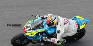 Simone Corsi (47) tucked in on the Squid Hunter Racing Yamaha YZF-R6 on the banking at Daytona International Speedway. Photo by Brian J. Nelson.