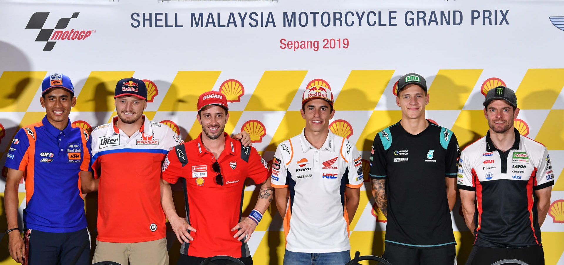 MotoGP riders (from left) Hafizh Syahrin, Jack Miller, Andrea Dovizioso, Marc Marquez, Fabio Quartararo, and Cal Crutchlow at the pre-event press conference in Sepang. Photo courtesy of Dorna/www.motogp.com.