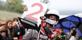 American Maxwell Toth, Age 13, Finishes 2nd In CIV PreMoto3 Race At Mugello American Max Toth celebrates his second-place finish in a CIV PreMoto3 race in parc ferme at Mugello.