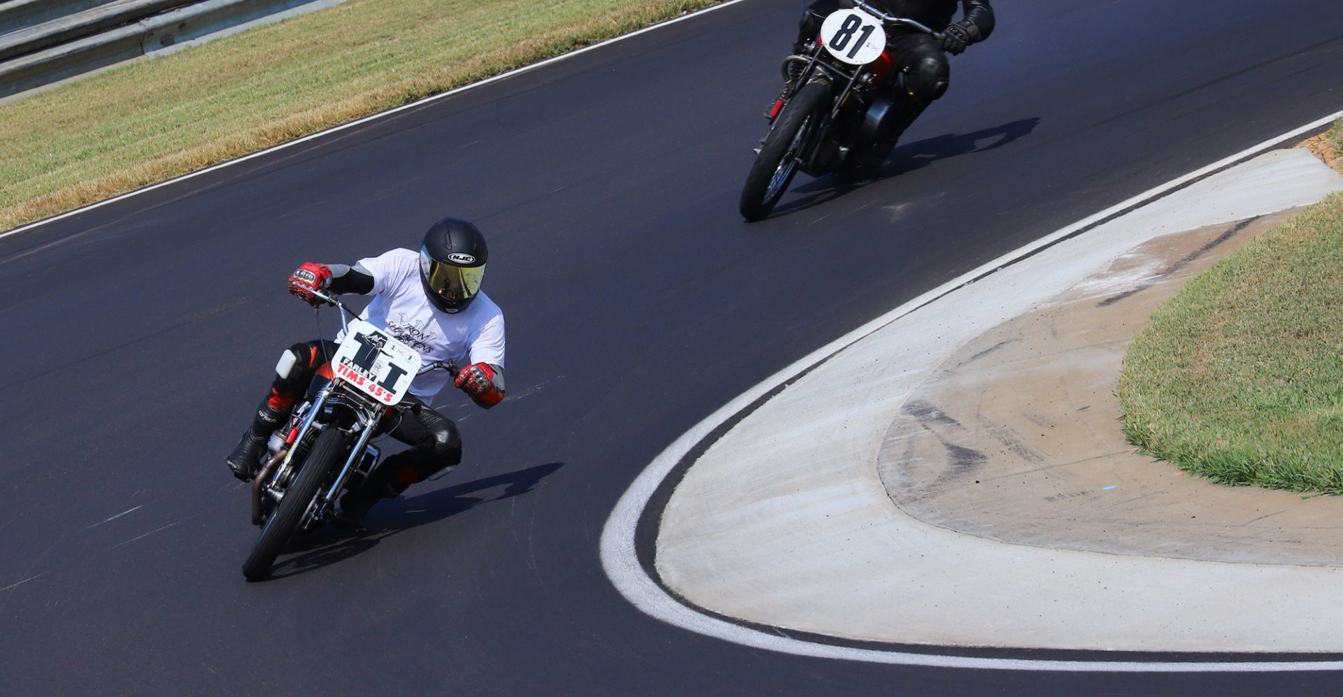 David Bourbeau (1I) narrowly defeated Ralph Wessell (81) in each of the AHRMA Handshift Shootout races at the Barber Vintage Festival. Photo by etechphoto.com, courtesy of AHRMA.