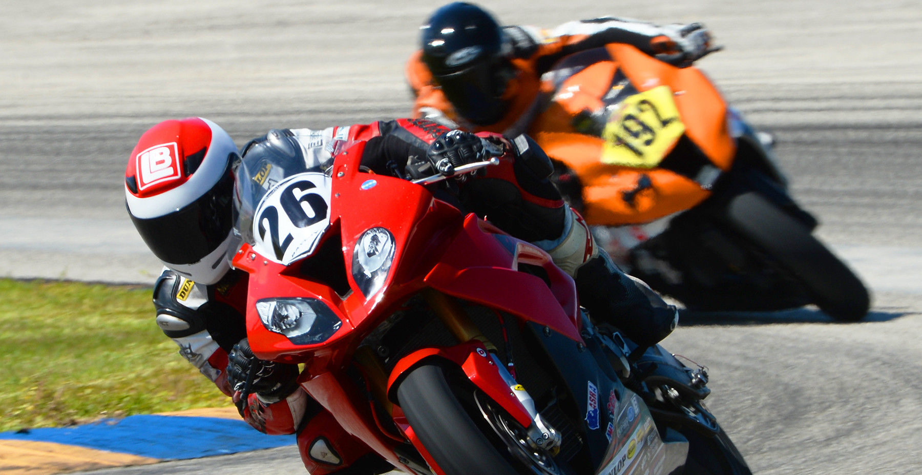 Lloyd Bayley (26) leading Amateur racer Alex Nieves, Jr. (192) during the CCS Unlimited Grand Prix at Homestead-Miami Speedway, in Homestead, Florida. Photo by Lisa Theobald, courtesy of ASRA/CCS.