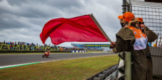 MotoGP: Qualifying Rescheduled For Sunday Morning At Phillip Island Marc Marquez (93) receives the red flag during FP4 at Phillip Island. Photo courtesy of Repsol Honda.