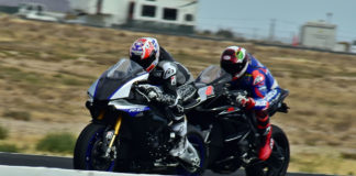 Former MotoGP World Champion Casey Stoner (left) and former AMA Superbike Champion Josh Herrin (right) on the main straight at Willow Springs International Raceway. Photo by Michael Gougis.