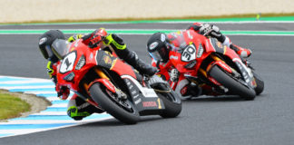 Troy Herfoss (1) and Mark Chiodo (30) in action at Phillip Island. Photo by Russell Colvin/Foremost Media, courtesy of Penrite Honda.