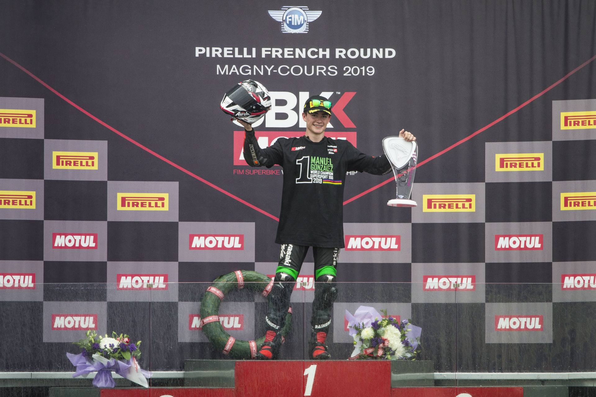 Manuel Gonzalez, the 2019 FIM Supersport 300 World Champion, on the podium at Magny-Cours. Photo courtesy of Kawasaki.
