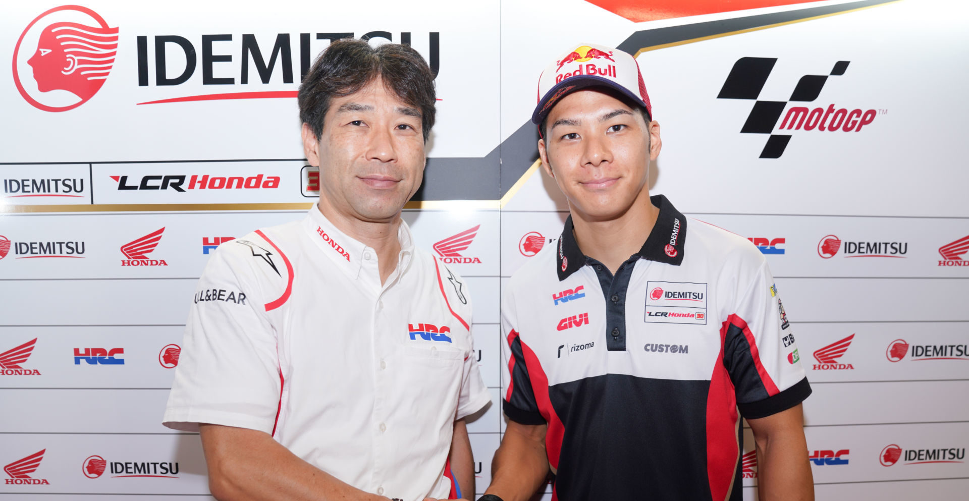 Takaaki Nakagami (right) with Tetsuhiro Kuwata, HRC Director - General Manager Race Operations Management Division (right). Photo courtesy of Honda Racing Corporation (HRC).