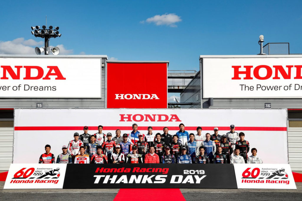 Honda Motor President Takahiro Hachigo (front row, center) with Honda racers. Photo courtesy of Honda Pro Racing.