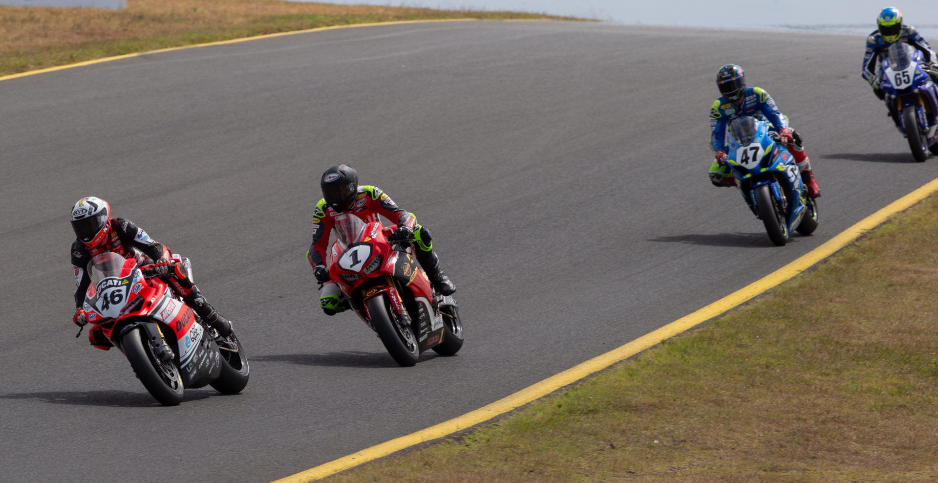 Mike Jones (46) leads Troy Herfoss (1), Wayne Maxwell (47), and Cru Halliday (65) at Sydney Motorsport Park. Photo by Andrew Gosling/TBG Sport, courtesy of Motorcycling Australia.