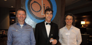 At the 14th annual Canadian Motorcycle Hall of Fame event in Toronto on Saturday evening, November 2, newly inducted member Michael Taylor (center) is joined by two-time CSBK overall National Champ Don Munroe (left), class of 2006, and 13-time Canadian National Superbike Champ Jordan Szoke (right). Photo by Colin Fraser, courtesy of PMP.
