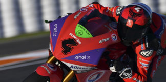 MotoE: Hector Garzo Quickest In Free Practice One At Valencia Hector Garzo (4) at speed Thursday at Valencia. Photo courtesy of Dorna/www.motogp.com.