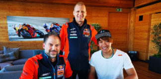 Red Bull KTM Ajo Moto2 racing team's Jens Hainbach (left) and Aki Ajo (center) with rider Tetsuta Nagashima (right). Photo courtesy of KTM.
