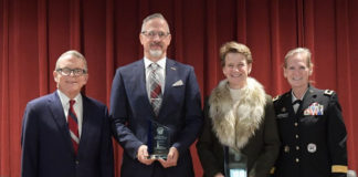 VETMotorsports Founder Peter Cline Honored In Ohio Peter Cline was one of two honorees recognized this past Veterans Day during a special presentation held at the Ohio Veterans Home in Georgetown, Ohio. Presenting the award was Governor Mike DeWine and the Director of the Ohio Department of Veteran Services MajGen (Ret.) Deborah A. Ashenhurst. (Photo left to right; award co-recipient Peter Cline, Ohio Governor Mike DeWine, award co-recipient Terese Hurin, Director of the Ohio Department of Veteran Services MajGen (Ret.) Deborah A. Ashenhurst. Photo courtesy of The Ohio Department of Veteran Services and VETMotorsports.