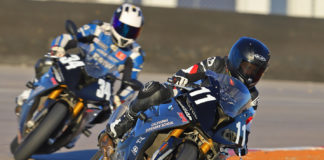 A California Superbike School instructor (34) follows a student (11) on track. Photo by etechphoto.com, courtesy of California Superbike School.