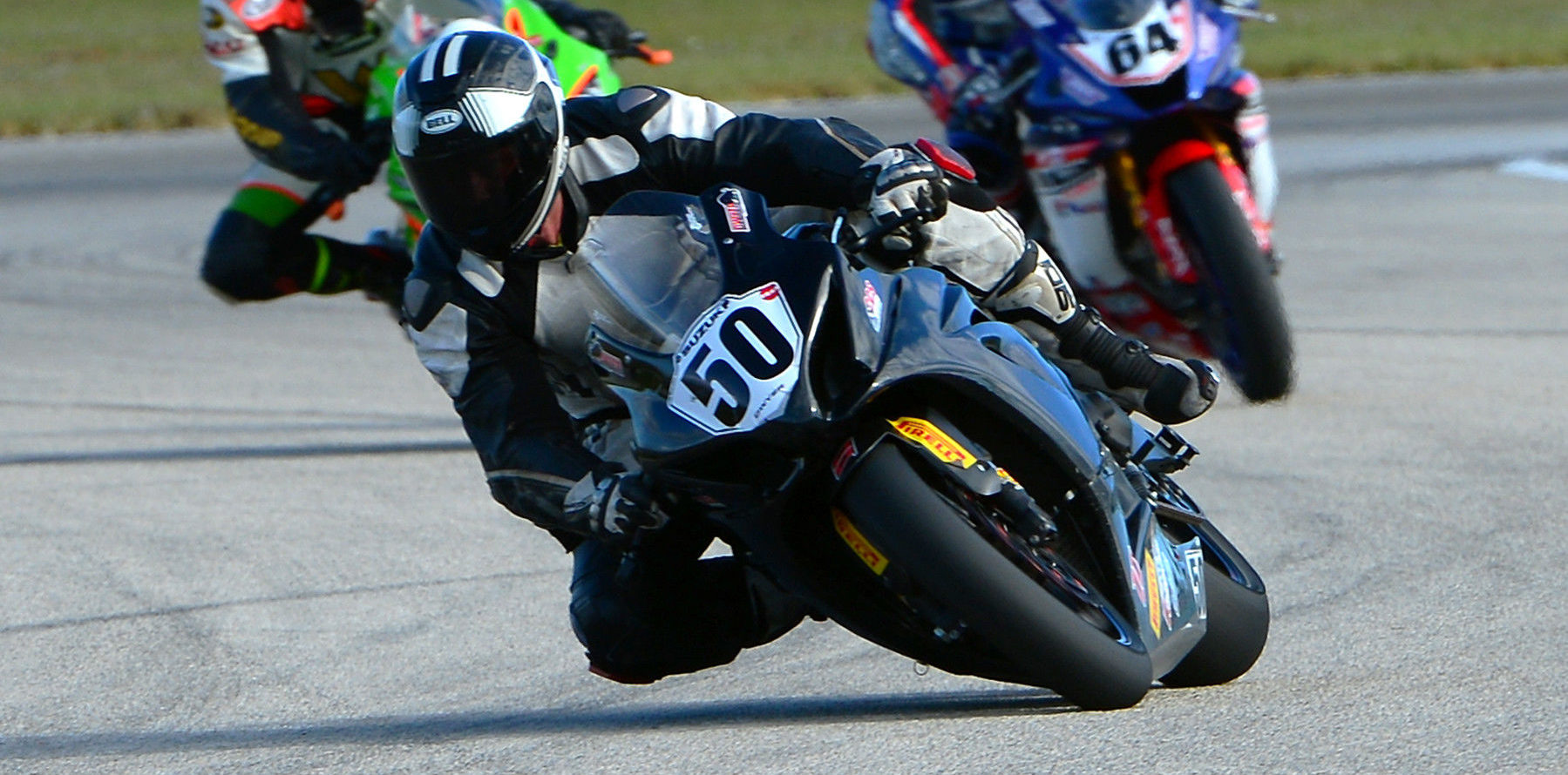 Sean Dwyer (50) leading Eric Wood and Max Angles (64) during the CCS Unlimited Grand Prix race at Homestead-Miami Speedway. Photo by Lisa Theobald, courtesy of ASRA/CCS.