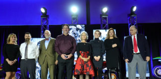 AMA Motorcycle Hall of Fame Class of 2019 (left to right): Trish Walksler and Matt Walksler, who accepted for Dale Walksler; former AMA Board of Directors chair Rick Gray, who accepted for Mark Buckner; Ron Lechien; Nancy Caselli and Sarah White, who accepted for the late Kurt Caselli; and Belen Wagner accompanying her father Wiltz Wagner. Photo by Jeff Kardas, courtesy of AMA.