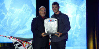AMA Director of Racing Kevin Crowther (left) presents the 2019 AMA Athlete of the Year from AMA National Championship Series Award to 11-time AMA/NATC MotoTrials Pro Class National Champion Pat Smage at the 2019 KTM AMA Championship Banquet. Photo by Jeff Kardas, courtesy of AMA.