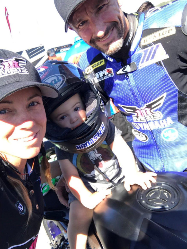 Josh Hayes (right), wife Melissa Paris (left), and two-year-old son Hawk (center). Photo courtesy of Phillip Island Grand Prix Circuit.