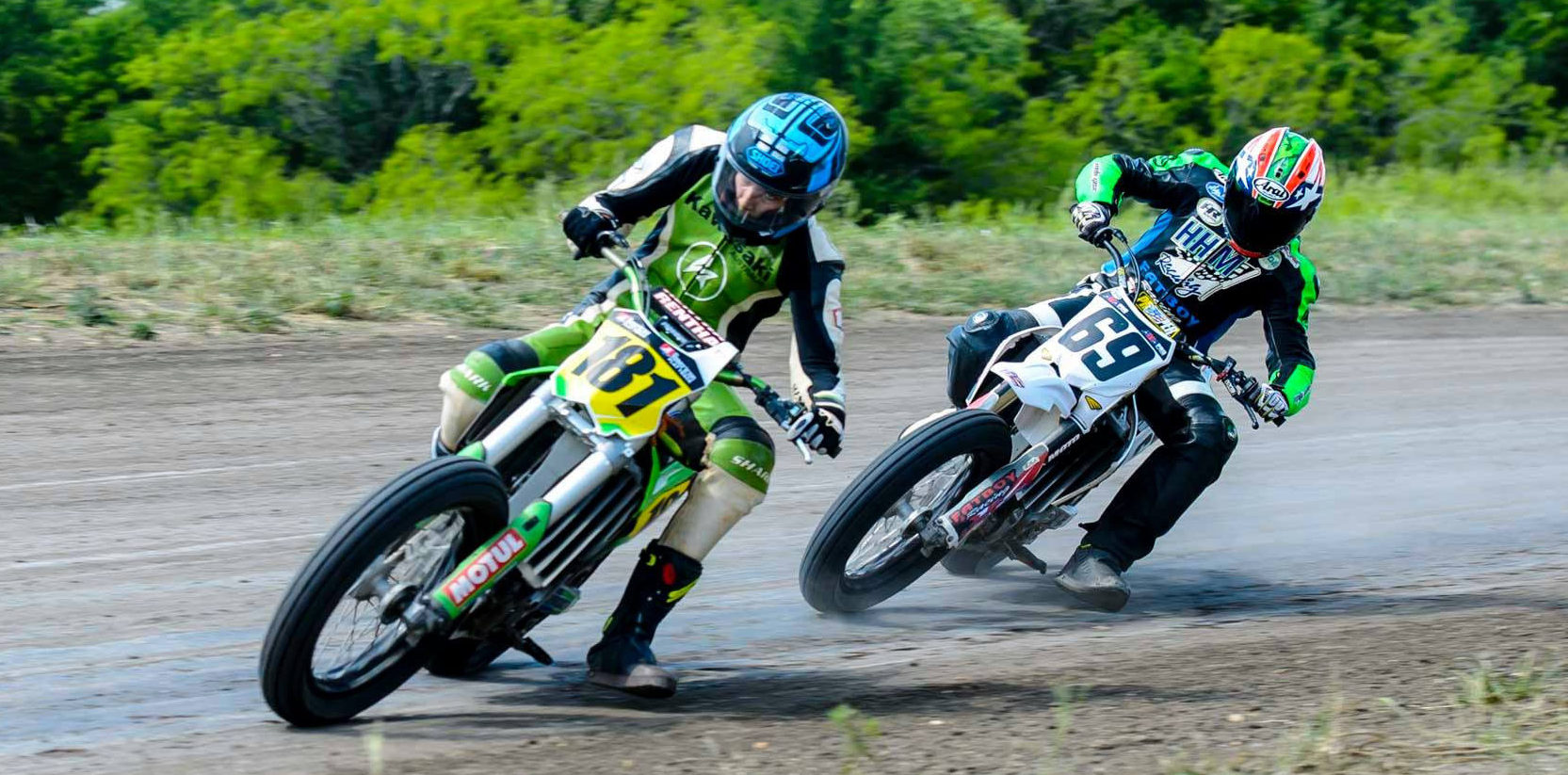 Max Whale (181) and Dallas Daniels (69) during a Vintage Dirt Track Racing Association (VDTRA) event. VDTRA is the predecessor of Xtreem Flat Track. Photo by Ken Kerr, courtesy of Xtreem Flat Track.