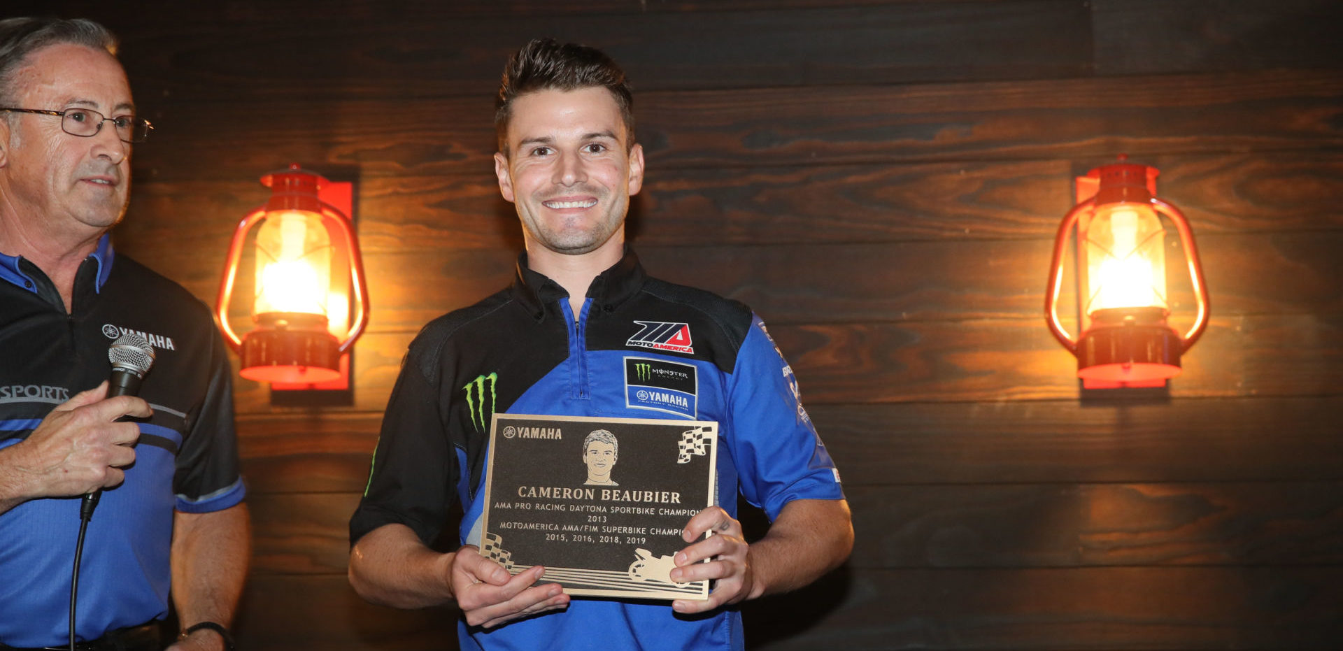 Four-time MotoAmerica Superbike Champion Cameron Beaubier (right), seen here with his 2019 team manager Tom Halverson (left), was one of the eight Yamaha racers honored in a ceremony in front of Yamaha employees in the Atlanta, Georgia area. Photo courtesy of Yamaha Motor Corp., U.S.A.