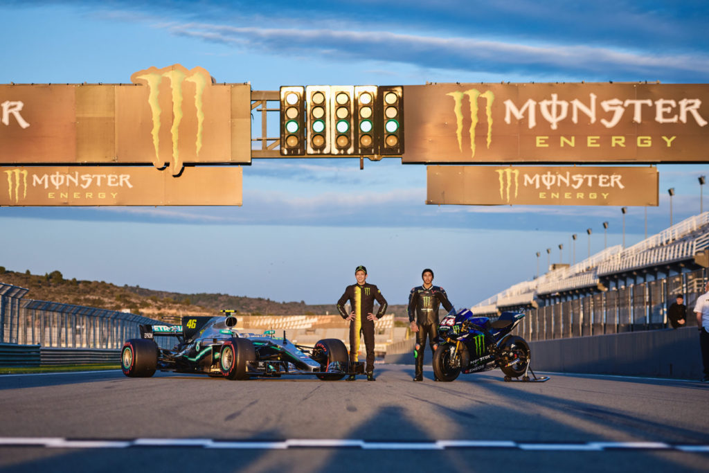 Formula One race car driver Lewis Hamilton with a Monster Energy Yamaha YZR-M1 MotoGP racebike (right) and MotoGP racer Valentino Rossi (46) with a Mercedes-AMG F1 W08 EQ Power+ Formula One race car (left) at Valencia. Photo courtesy of Monster Energy Yamaha.