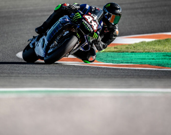 Formula One race car driver Lewis Hamilton (44) on a Monster Energy Yamaha YZR-M1 MotoGP racebike (44) at Valencia. Photo courtesy of Monster Energy Yamaha.