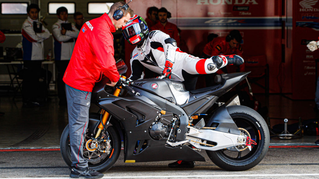 Leon Haslam mounts his Honda CBR1000RR-R Fireblade SP. Photo courtesy of Dorna WorldSBK Press Office.