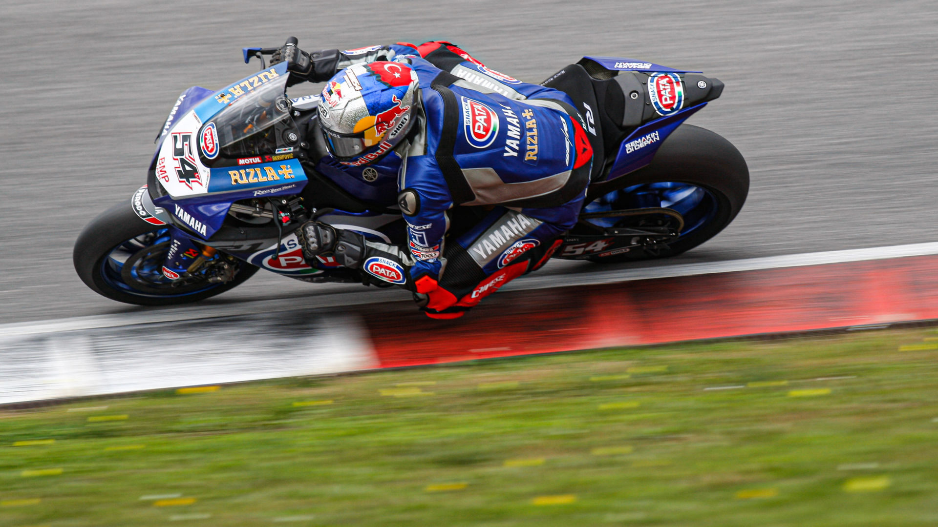 Pata Yamaha’s Toprak Razgatlioglu (54) at speed in Portugal. Photo courtesy of Dorna WorldSBK Press Office.