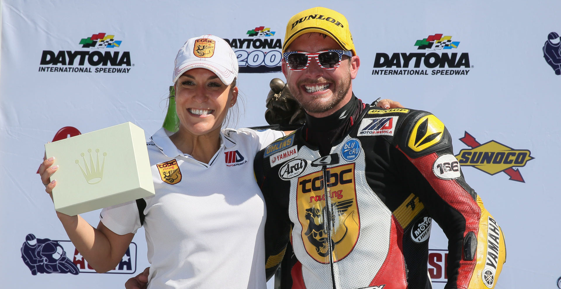 TOBC Racing Team Owner Michelle Lindsay (left) with rider Danny Eslick (right) after winning the 2018 Daytona 200, their third win together and Eslick’s fourth Daytona 200 win overall. Lindsay, Eslick, and TOBC Racing will be honored during a celebration on March 11 at the Daytona 200 Memorial in Daytona Beach, Florida. Photo by Brian J. Nelson.