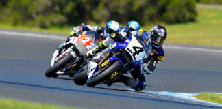 Josh Hayes (4) leads Jed Metcher (22) at Phillip Island. Photo by Russell Colvin, courtesy of Phillip Island Grand Prix Circuit.