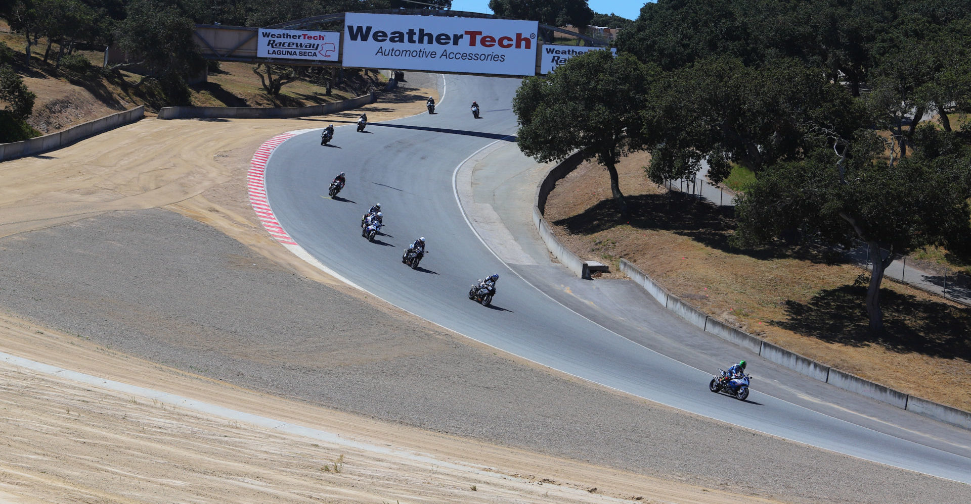 Motorcycles on track at WeatherTech Raceway Laguna Seca. Photo by Etechphoto.com, courtesy of AHRMA.