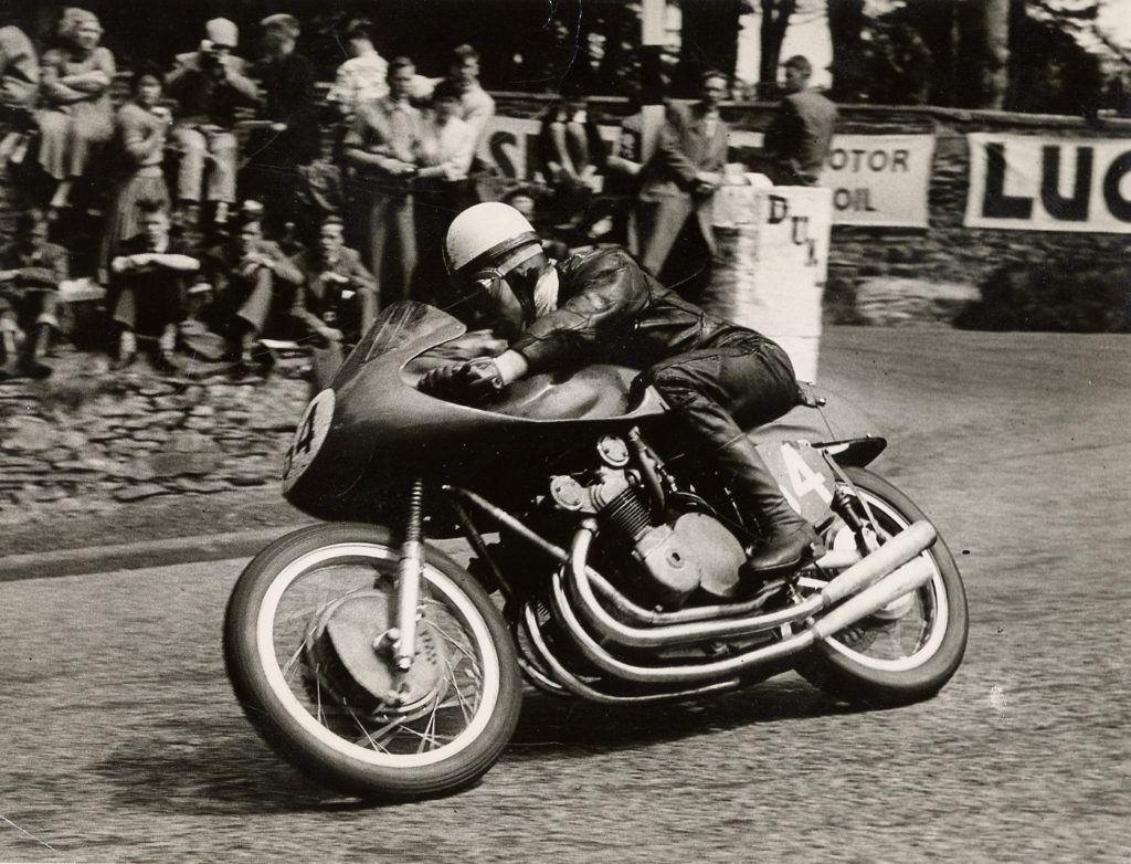 John Surtees riding a 1956 MV Agusta 350cc four-cylinder Grand Prix racebike. Photo courtesy of MV Agusta.