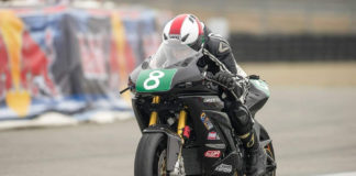 Arthur Kowitz (8) in action on an electric road race motorcycle. Photo courtesy of Arthur Kowitz.