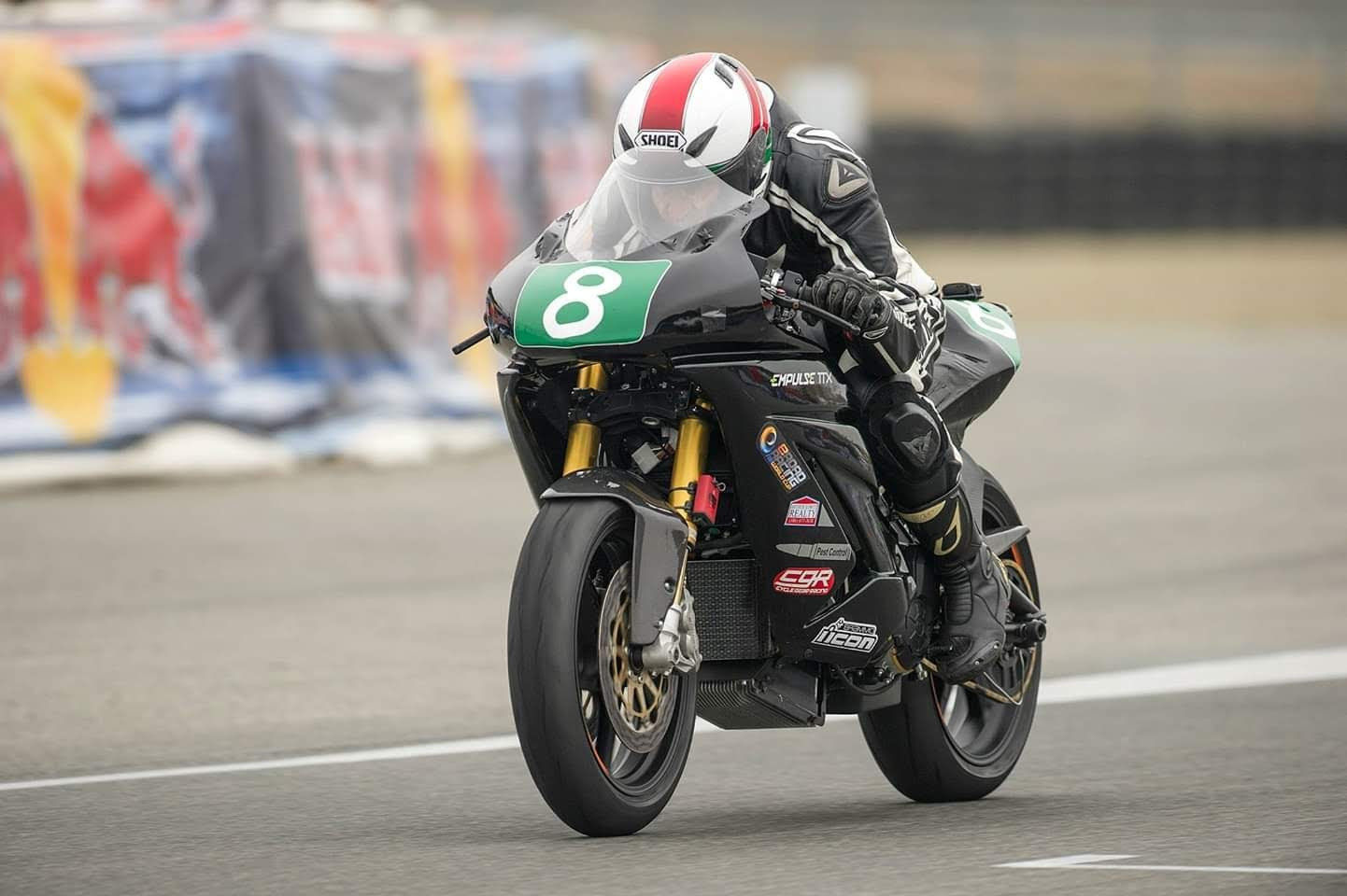 Arthur Kowitz (8) in action on an electric road race motorcycle. Photo courtesy of Arthur Kowitz.