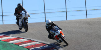 Dave Roper (7) leads Andrew Mauk (1) down the Corkscrew at WeatherTech Raceway Laguna Seca on his way to victory in AHRMA Vintage Cup Round Two. Photo by etechphoto.com, courtesy of AHRMA.