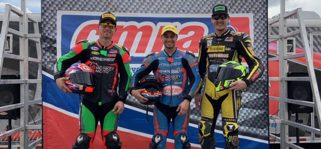 Formula One Expert race winner JC Camacho (center), runner-up Doug Frenchak (left), and third-place finisher Alan Phillips (right) on the podium at MSR Houston. Photo by Alonzo G. Contreras, courtesy of CMRA.