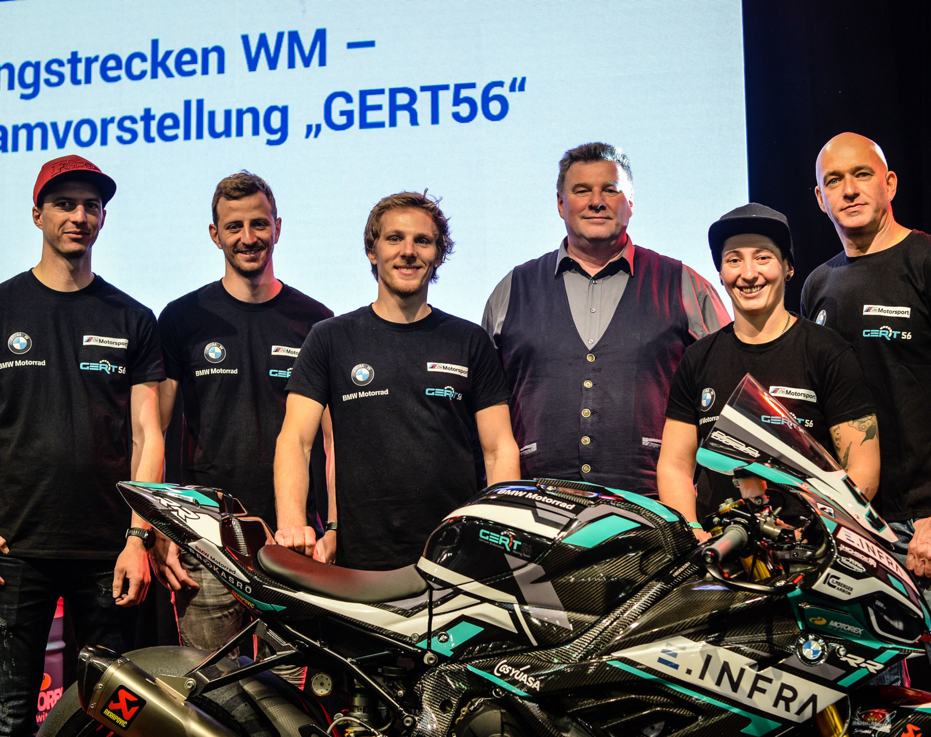 (From right): Ronny Schlieder, Lucy Glöckner, Karsten Wolf, Pepijn Bijsterbosch, Stefan Kerschbaumer, and Toni Finsterbusch. Photo courtesy of Wunderlich Motorsport.