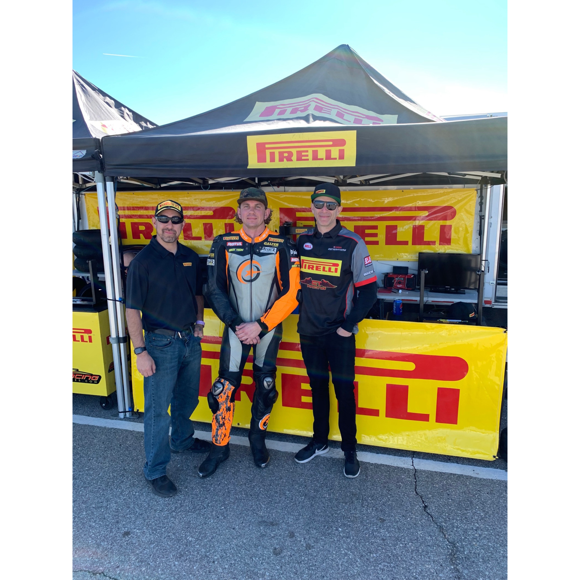 Pirelli Road Race Manage Oscar Solis (left), Moto Station’s Kory Cowan (center), and CT RACING owner Corey Neuer (right). Photo courtesy of CT Racing.