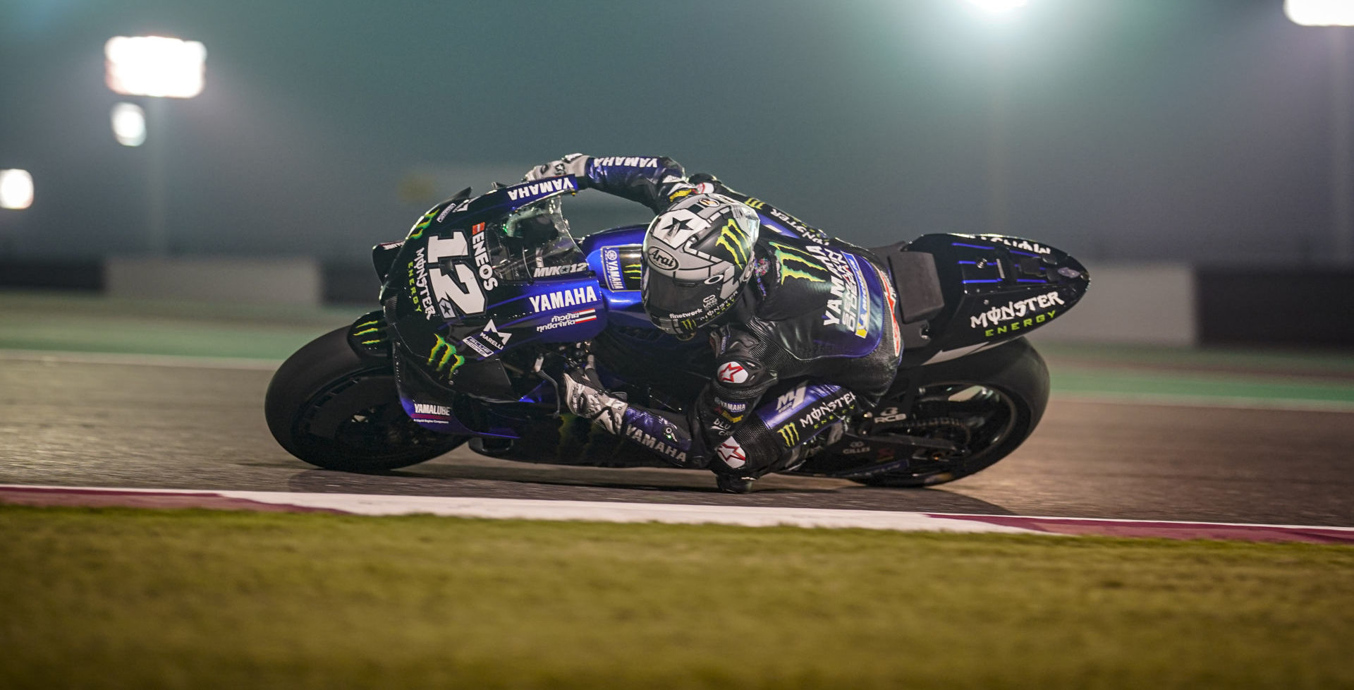 Maverick Vinales (12) at speed under the lights in Qatar. Photo courtesy of Monster Energy Yamaha.