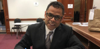 Caesar Gonzales signing the paperwork to seek election to the U.S. Congress. Photo courtesy of Caesar Gonzales.