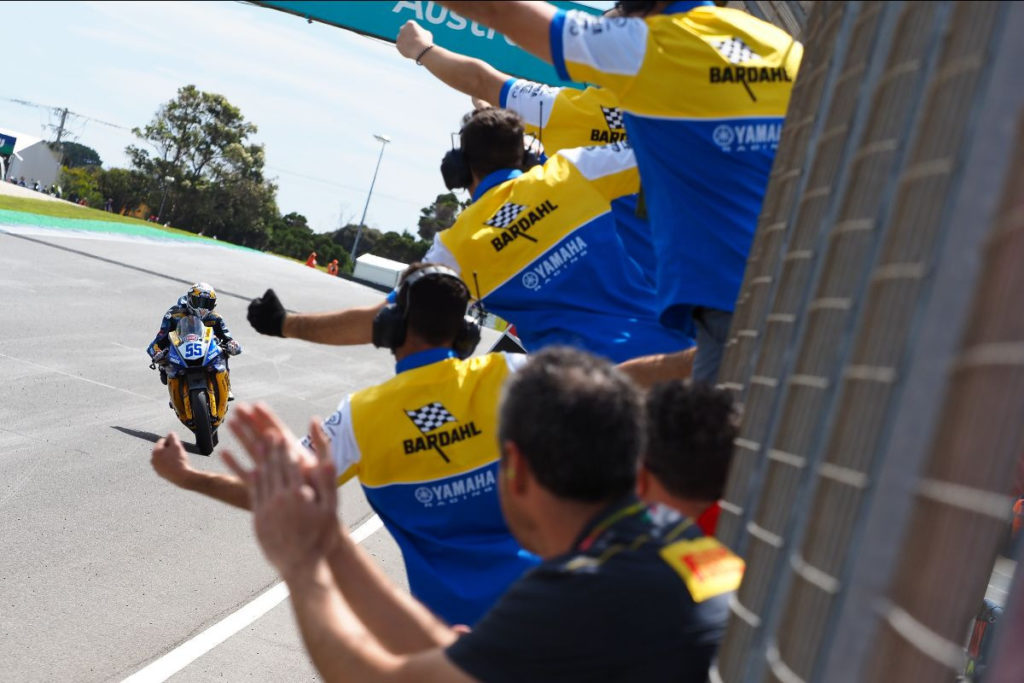 Andrea Locatelli (55) acknowledges his crew on his way to the checkered flag at Phillip Island. Photo courtesy of Dorna WorldSBK Press Office.