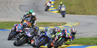 Toni Elias (24) leading JD Beach (95), Garrett Gerloff (31), Josh Herrin (2), Mathew Scholtz (11), Cameron Beaubier, Jake Lewis, and Jake Gagne during a MotoAmerica Superbike race at Michelin Raceway Road Atlanta in 2019. Photo by Brian J. Nelson.