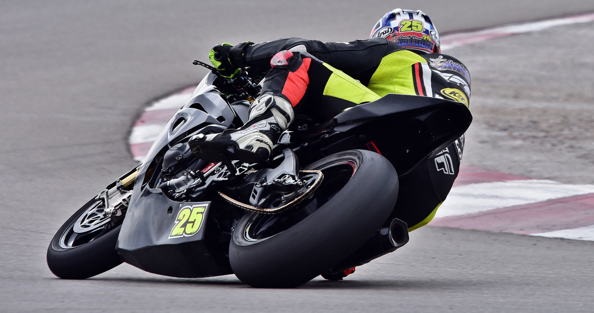 “Aussie Dave” Anthony (25) at speed during a WERA West event at the Las Vegas Classic Circuit, in Las Vegas, Nevada. Photo by Michael Gougis.