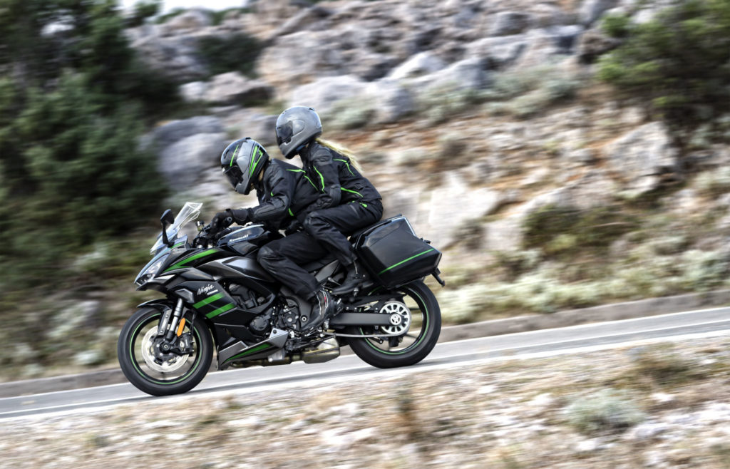 A 2020 Kawasaki Ninja 1000SX being ridden two-up with optional hard cases attached. Photo courtesy of Kawasaki.